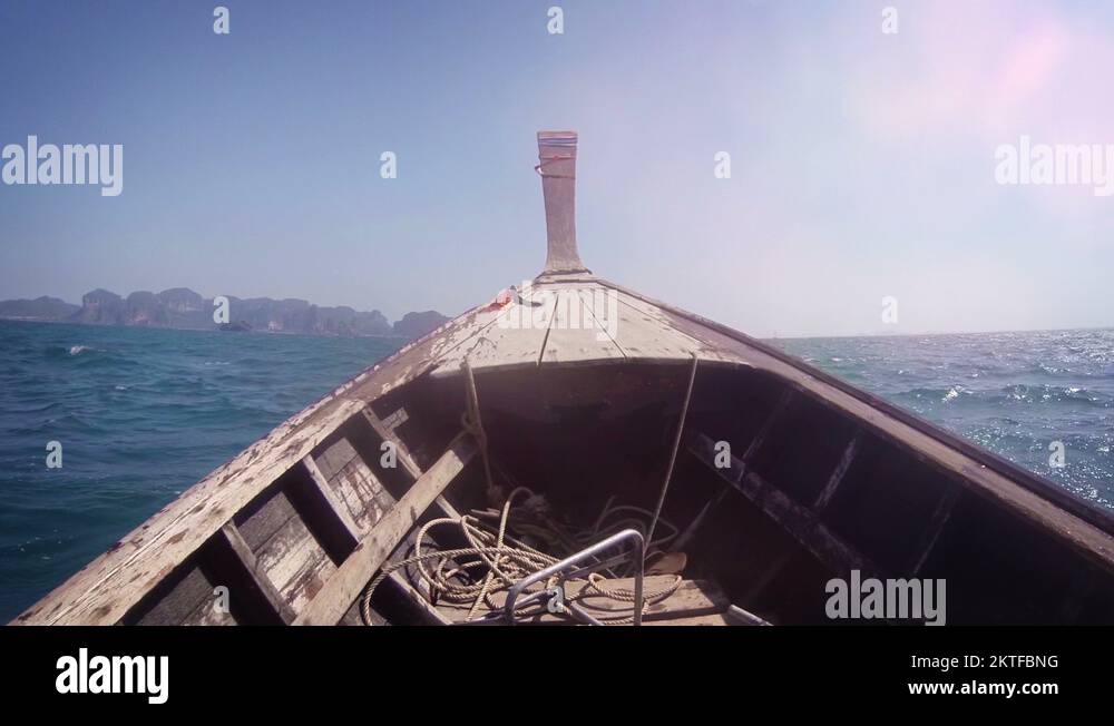 Handmade Longtail Boat Cruises over Rough Water in Thailand, with sound