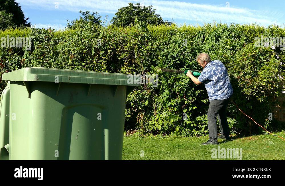 Garden wheelie bin Stock Videos & Footage HD and 4K Video Clips Alamy