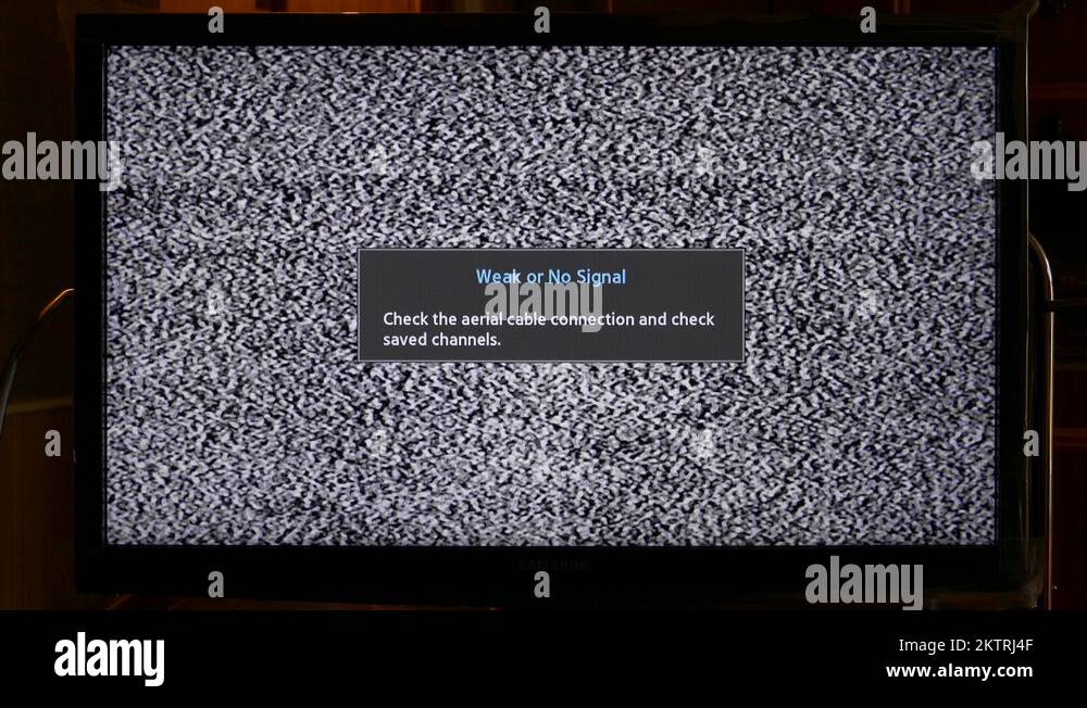 Ungraded LCD Television Set Displays Static Noise and Message "Weak or