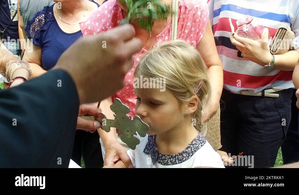Traditional orthodox paschal ritual, priest blessing child Stock Video ...