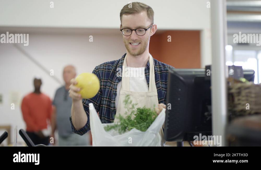 Portrait customer supermarket checkout assistant Stock Videos & Footage ...