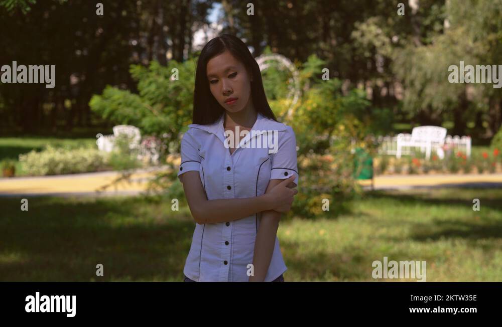 Cute student shows melancholy emotion on the perfect face Stock Video