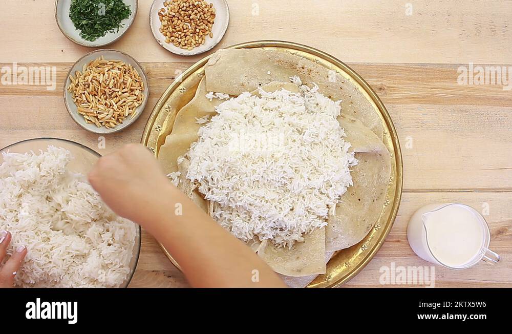 Mansaf Jordanian Lamb, Yogurt pita bread Rice Pilaf Stock Video Footage