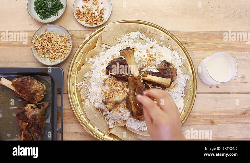 Mansaf Jordanian Lamb, Yogurt nuts Rice Pilaf Stock Video Footage Alamy
