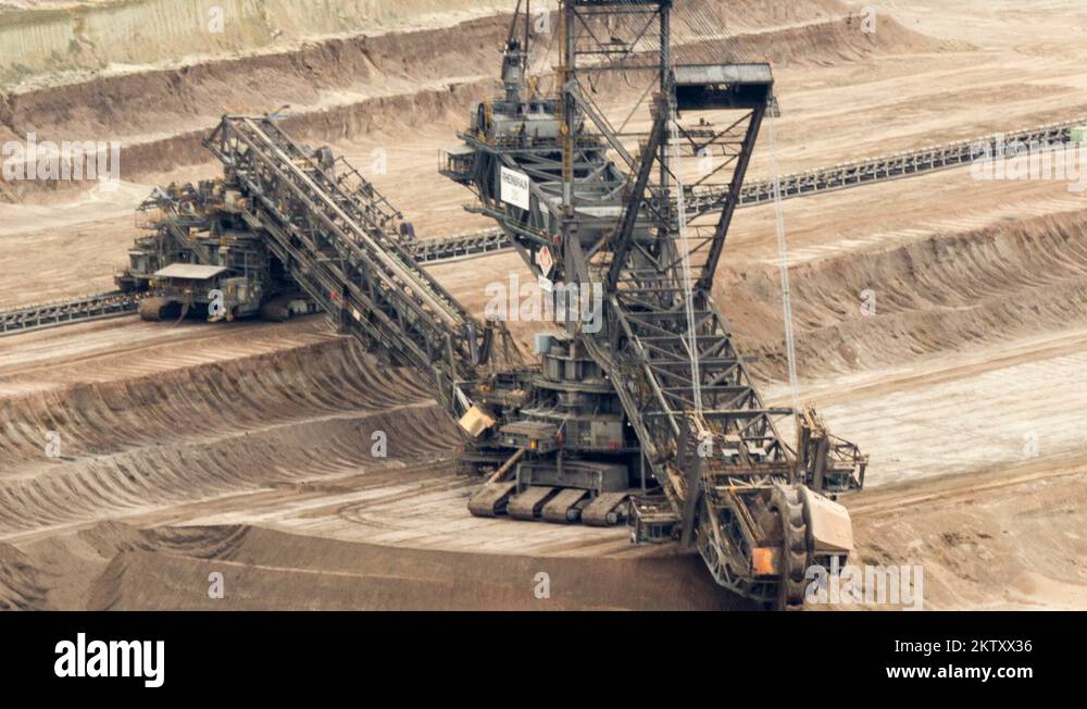 Bucketwheel excavator in a lignite mine time lapse Stock Video
