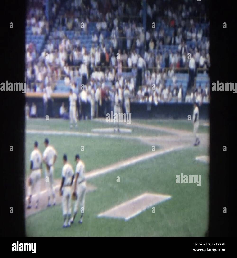 1964 professional ball game with crowd in the stands. YANKEE STADIUM