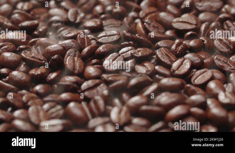 4K Aroma of coffee, Roasted Coffee Bean, rotation and rising smoke ...