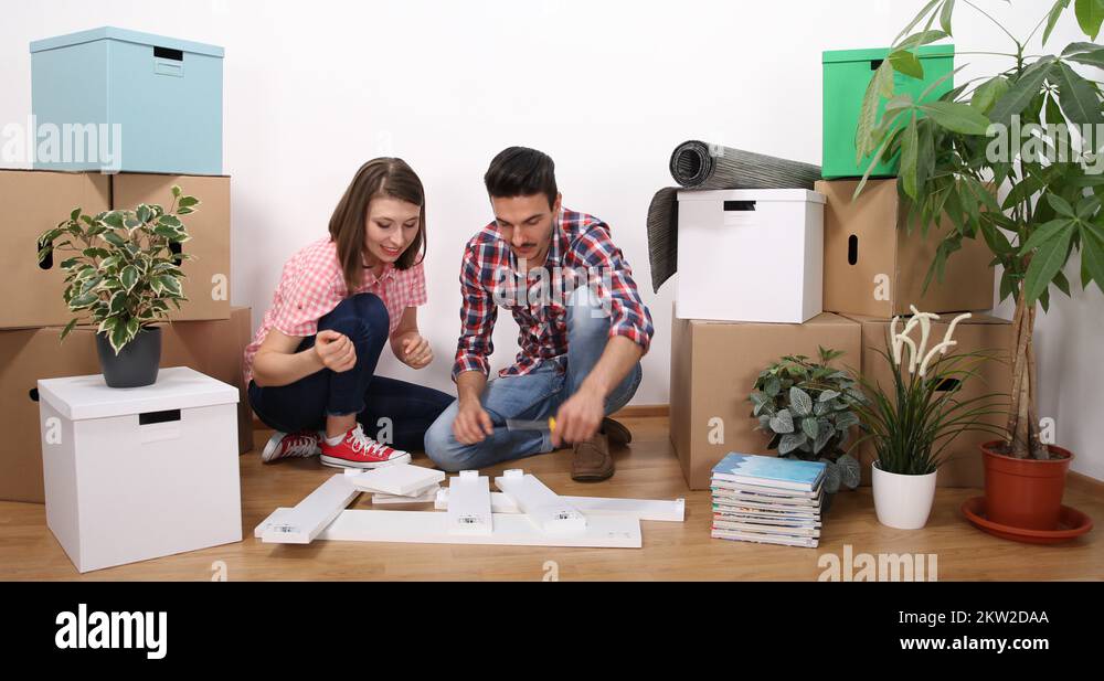 Young Couple Sit Matching Furniture Pieces Manual Assemble Diy Floor