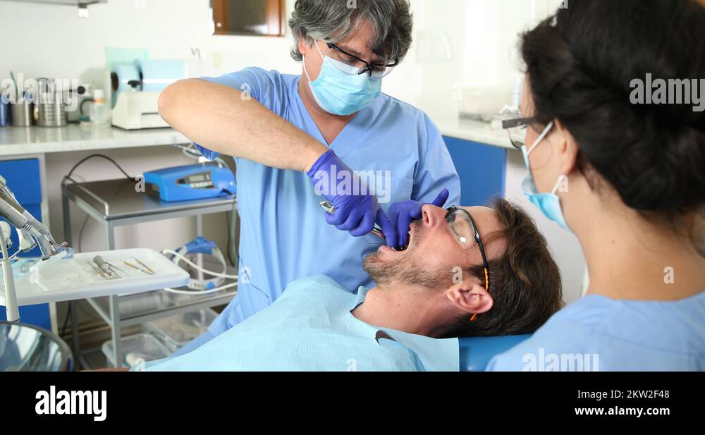 Pull teeth Stock Videos & Footage HD and 4K Video Clips Alamy