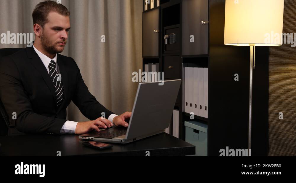 Successful Businessman Take Pictures Pie Chart with Mobile in Office