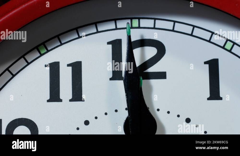 Alarm clock time lapse zoom in going forwards to midnight and then back