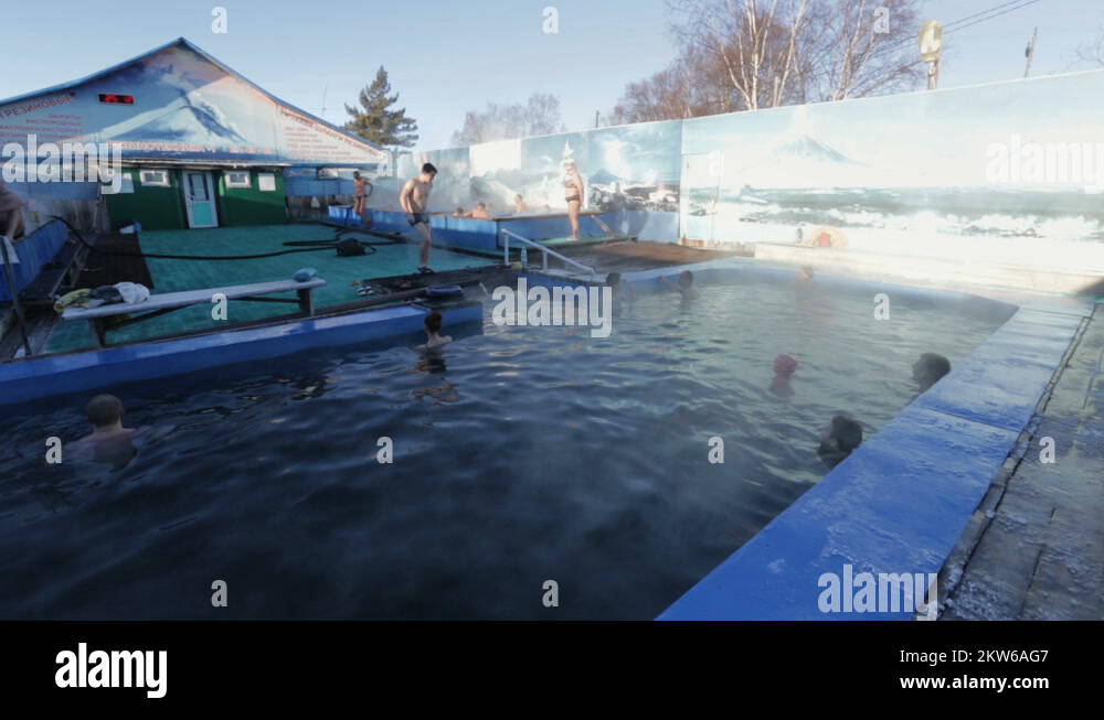 People bathe in pool with natural thermal mineral water Stock Video