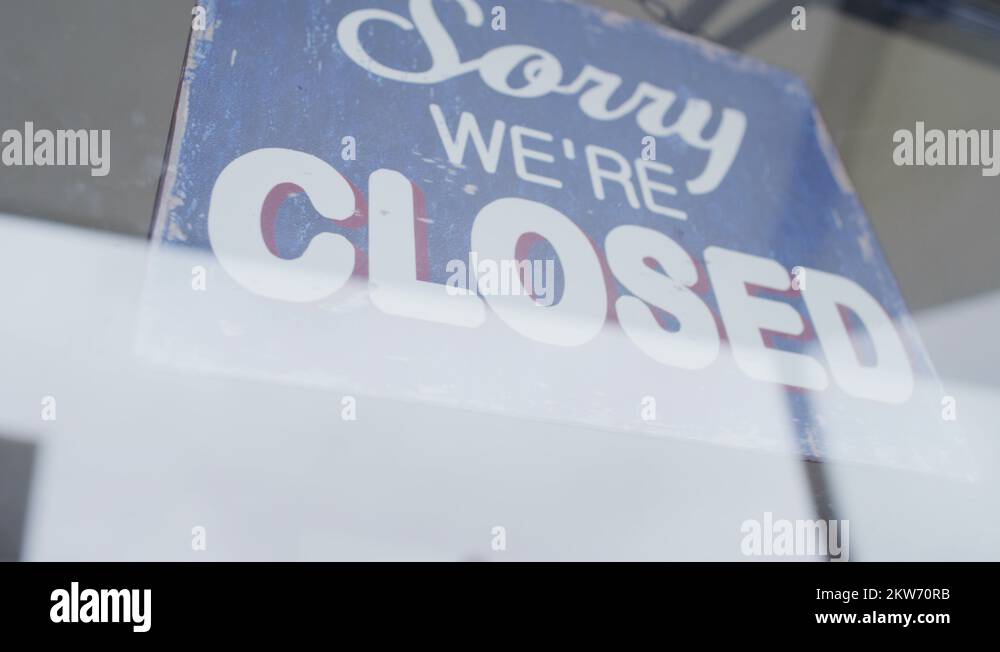 4K 'Closed' sign is turned to 'Open' in a storefront window Stock Video ...