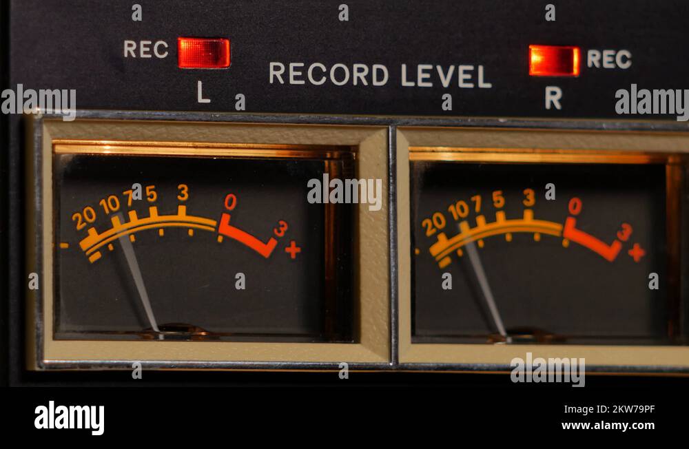 Analog vu meter of a vintage tape recorder machine while recording