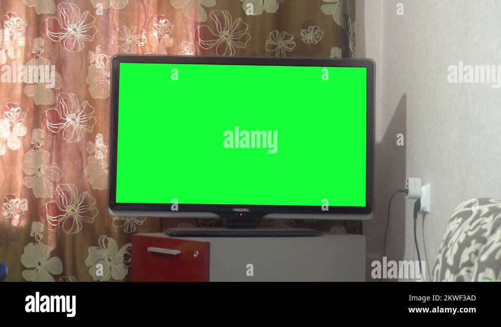 Dolly Move Into A Big Screen TV With Greenscreen Stock Video Footage dolly-move-into-a-big-screen-tv-with-greenscreen-stock-video-footage