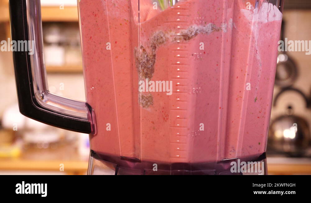 Making strawberry fruit shake in blender 4K Stock Video Footage Alamy