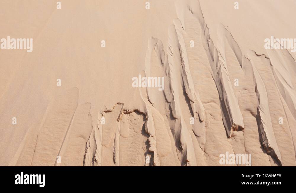 Shallow ravines formed in the side of dune Stock Video Footage Alamy
