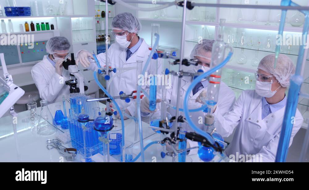 Medical Researchers Team Collaboration in Laboratory Glassware and ...
