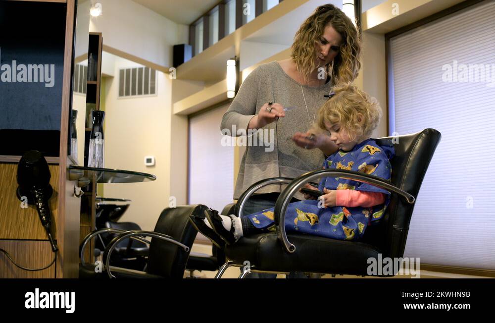 Girl Having Her Hair Cut In A Salon Stock Video Footage Alamy Girl Having Her Hair Cut In A Salon Stock Video Footage Alamy