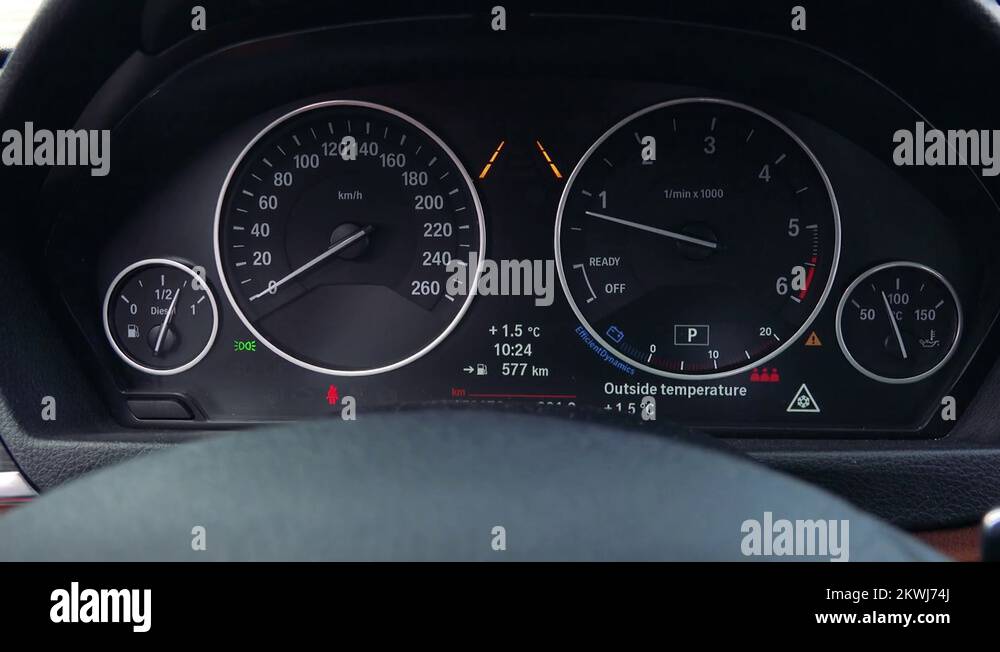 A modern car dashboard lights up closeup Stock Video Footage Alamy