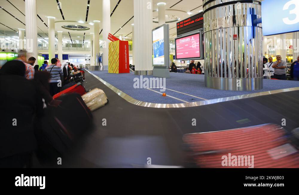 The arrival of luggage on the carousel at Dubai Airport, Dubai, UAE, T
