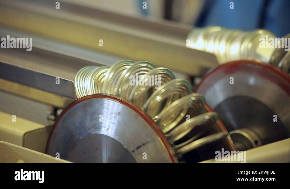 Canning factory conveyor belt. Can manufacturing process. Canning