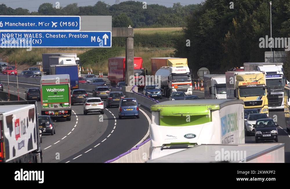 Traffic in fast motion on motorway in Manchester going to Airport 4K