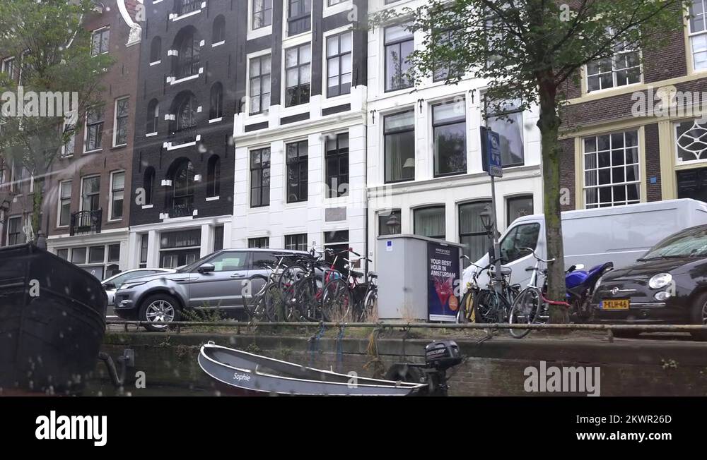 Rain rainy day in Amsterdam floating houses Netherlands architecture