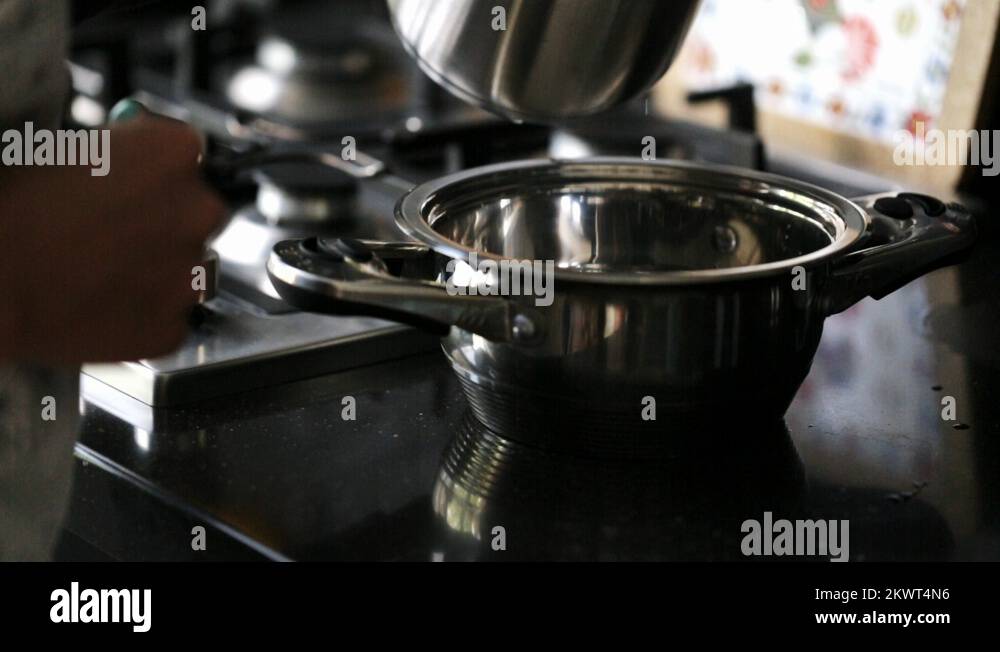 Woman pouring boiling Stock Videos & Footage HD and 4K Video Clips