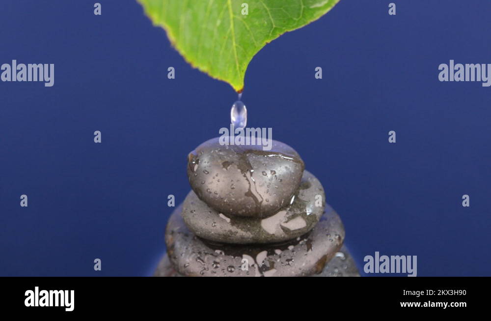 Drop flows through the sheet and is incident on a pyramid made of black