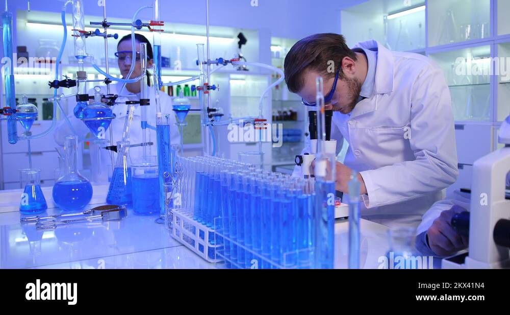 Positive Researcher Researcher Man Talking Camera Positive Result on Microscope Teamwork ...