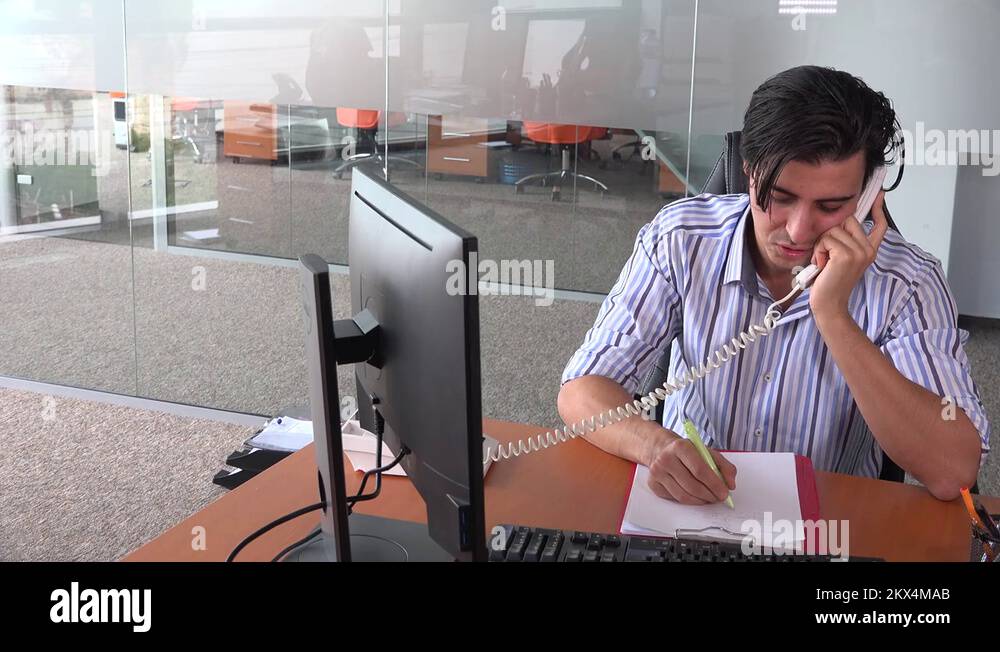 Angry executive manager business man in the office ending landline