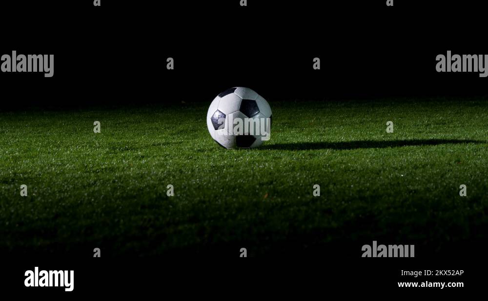 Soccer player performing a sliding tackle on playing field 4k Stock