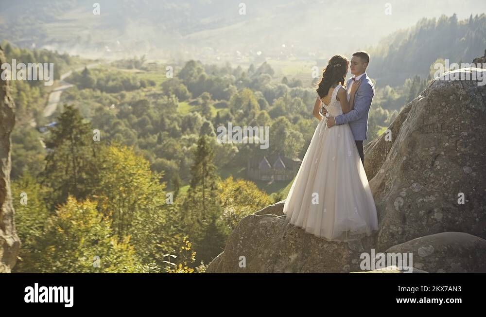 Romantic couple kissing in their wedding day Stock Video Footage Alamy