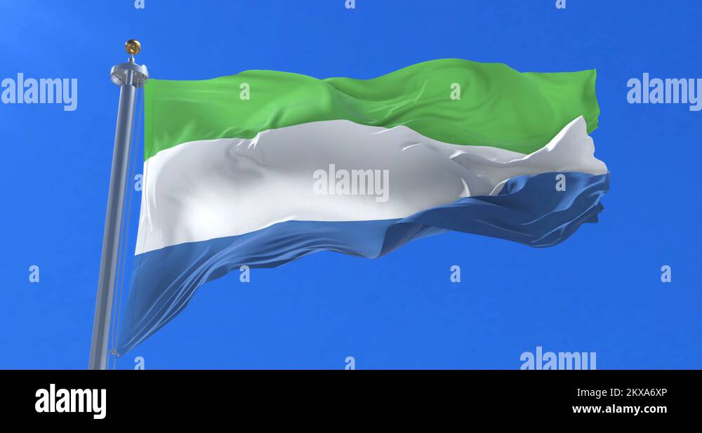 Flag of Sierra Leone waving at wind in slow with blue sky, loop Stock ...
