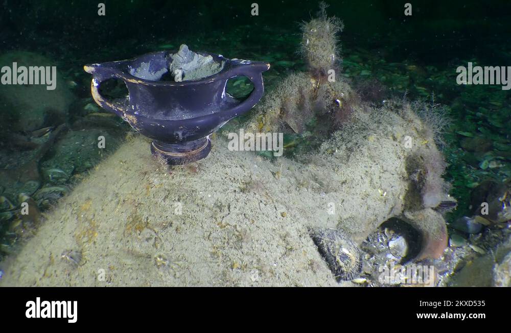 Underwater archeology Ancient Greek Blackglazed ware on the seabed