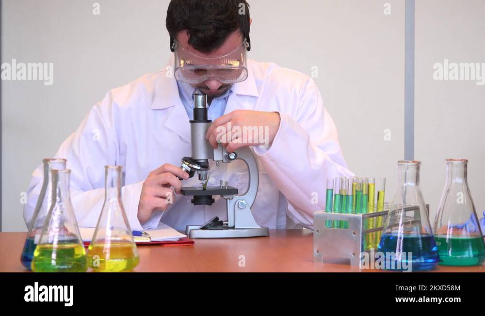 Lab science professional biologist researcher use microscope write