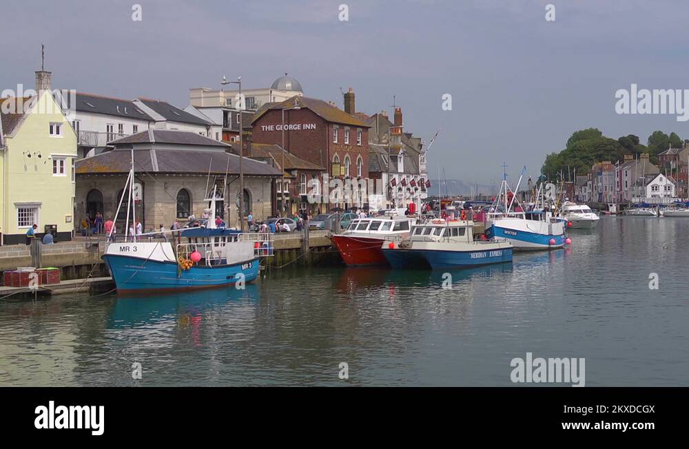 The old harbour and waterfront at Weymouth, Dorset GV Stock Video
