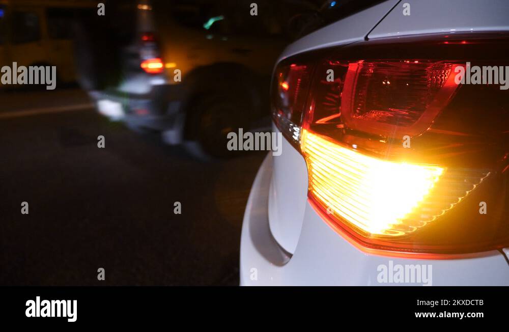 night. car blinker light. emergency car warning light on the background