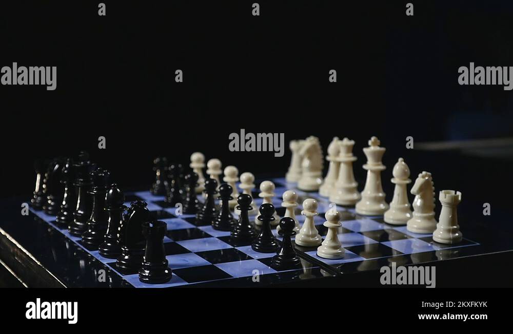 Chess boards and chess pieces game on black background. game for money