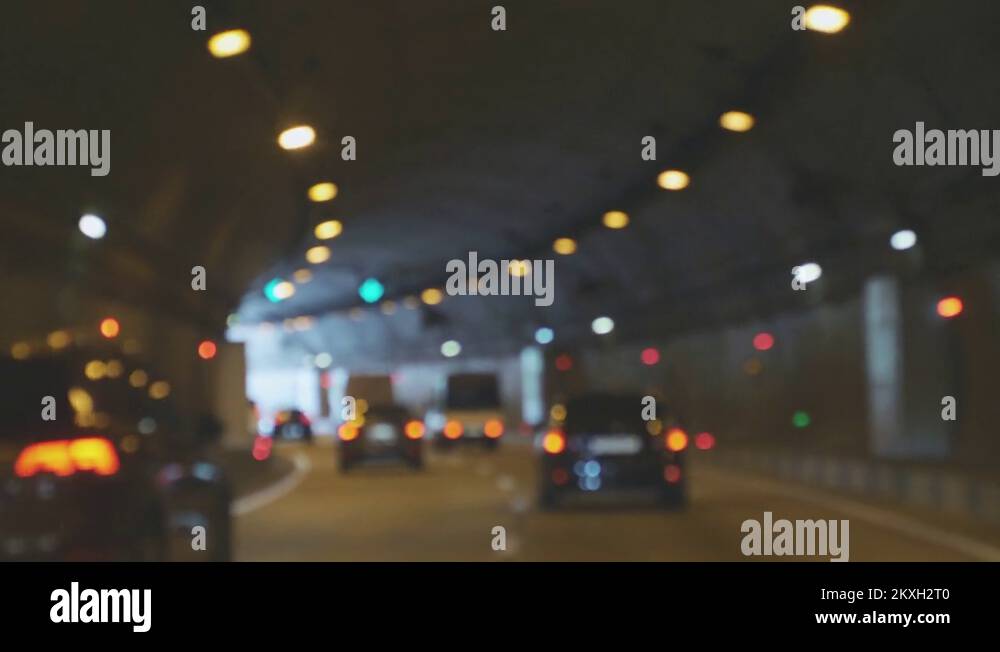 Cars driving in the tunnel bokeh background. 4k, 3840x2160 Stock Video