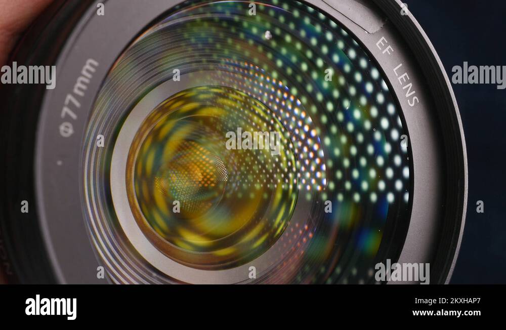 Video camera lens, showing zoom and glare, turns, close up Stock Video