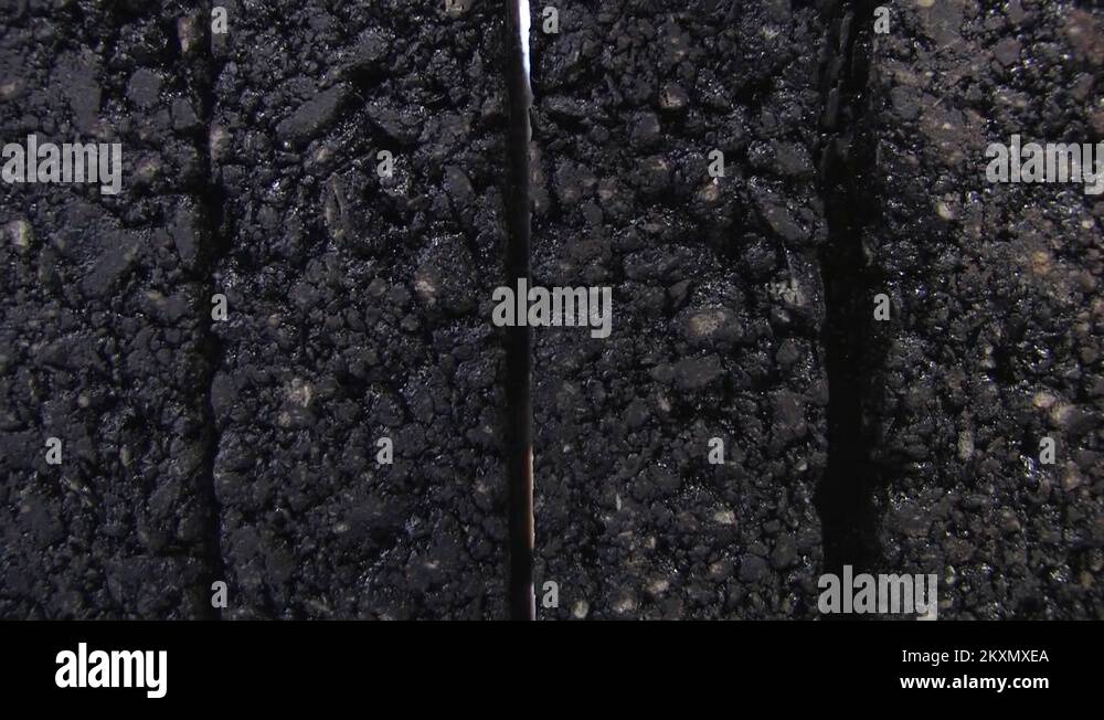 Sample of modern rubber asphalt with a detailed scientific cut