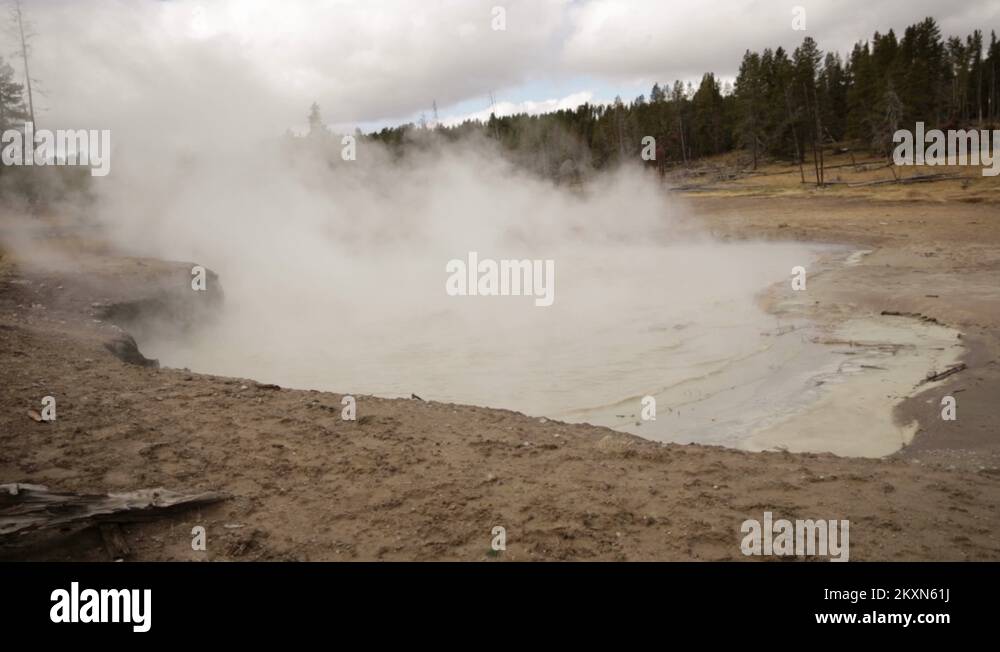 Smoke and Steam Rising from Hot Springs in Yellowstone National Park