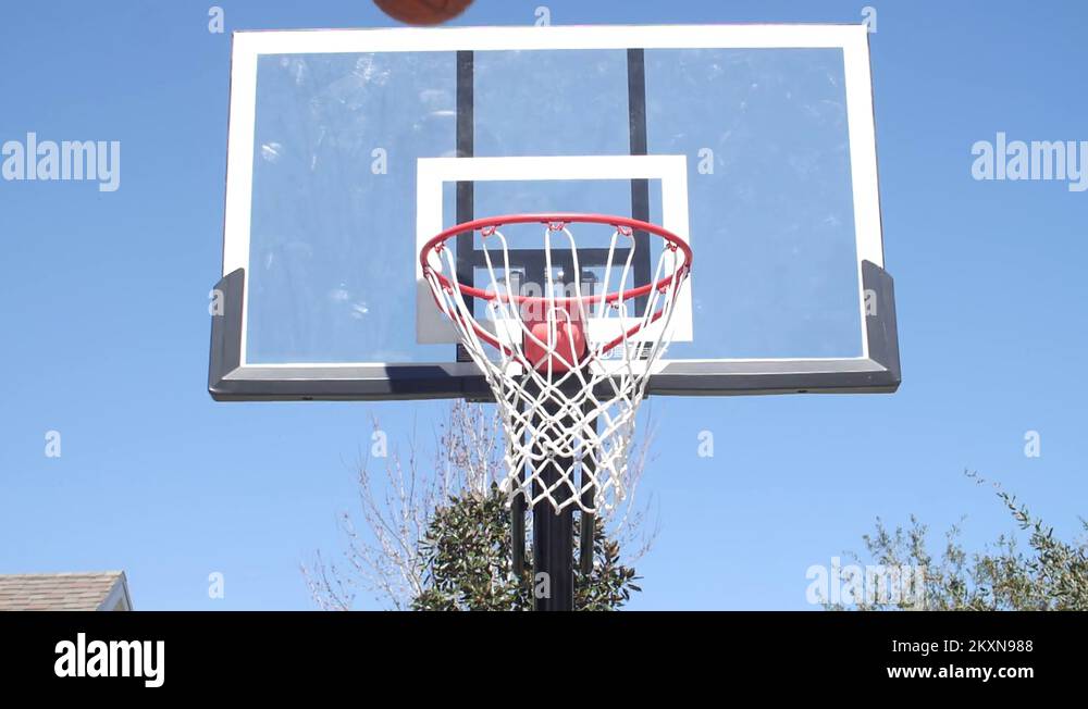 little boy kid throwing basketball children play shooting the ball in