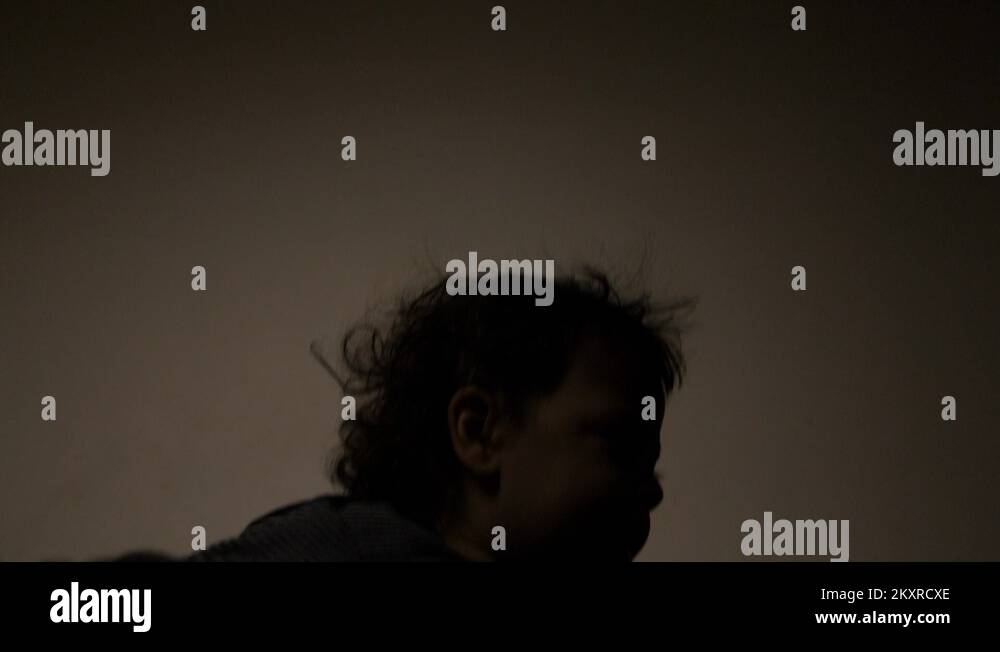 Slow motion Young cute baby boy being thrown in the air by his dads