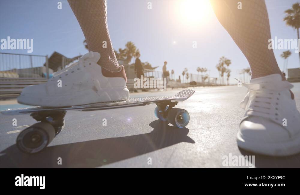 Skateboard with its wheels spinning. Slow motion 4k Stock Video Footage