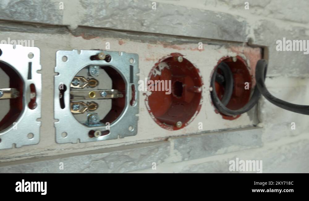 Openings With Wires In The Wall For Sockets Stock Video Footage - Alamy