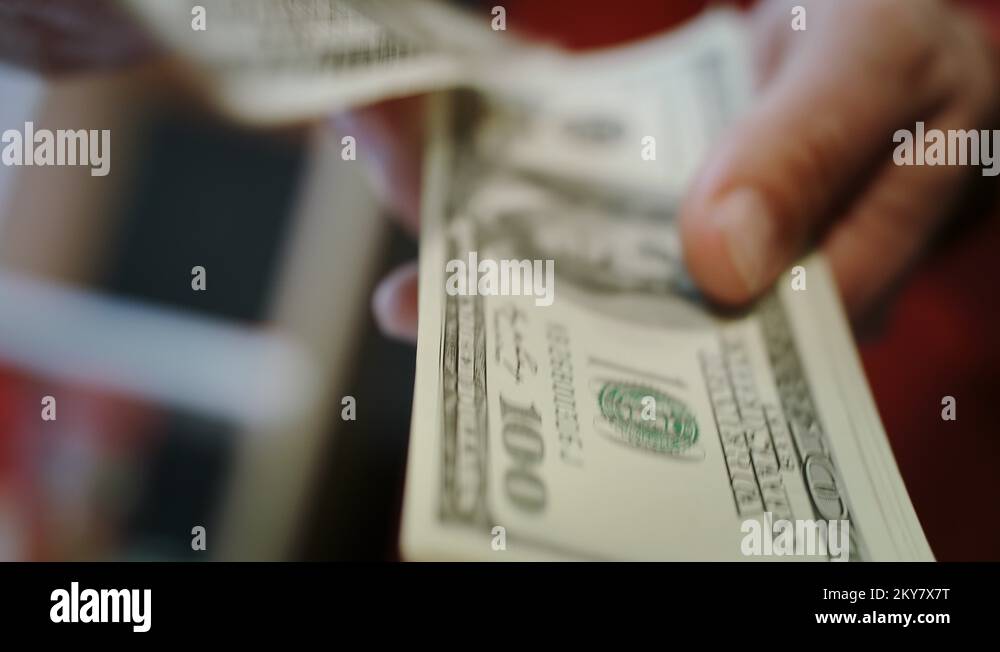 Human hands counting dollar bills. Close up of hands count money cash
