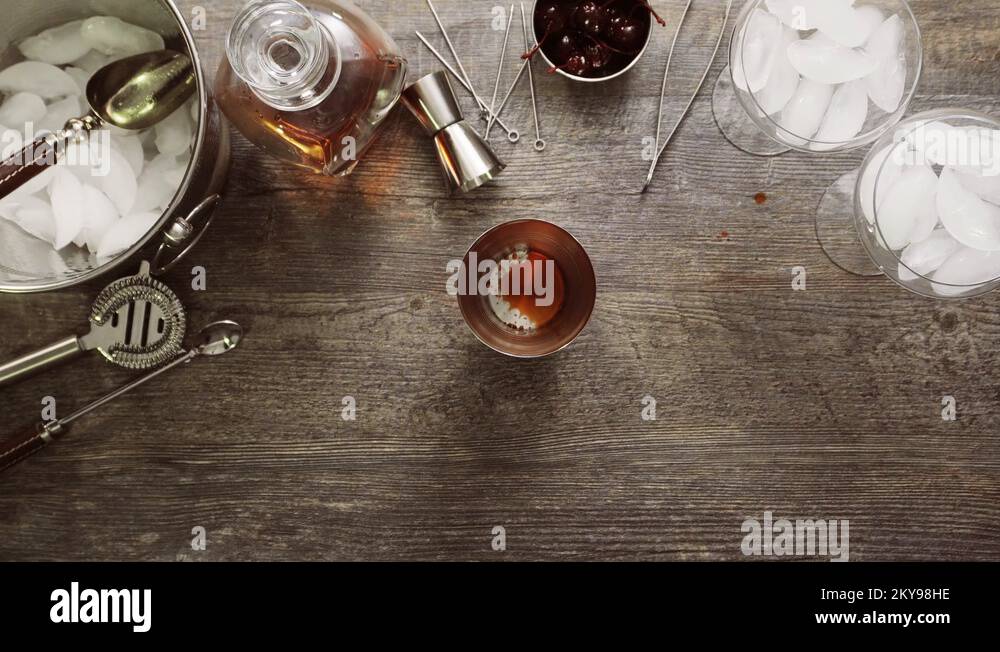 Step by step. Preparing Manhattan cocktail at home bar Stock Video